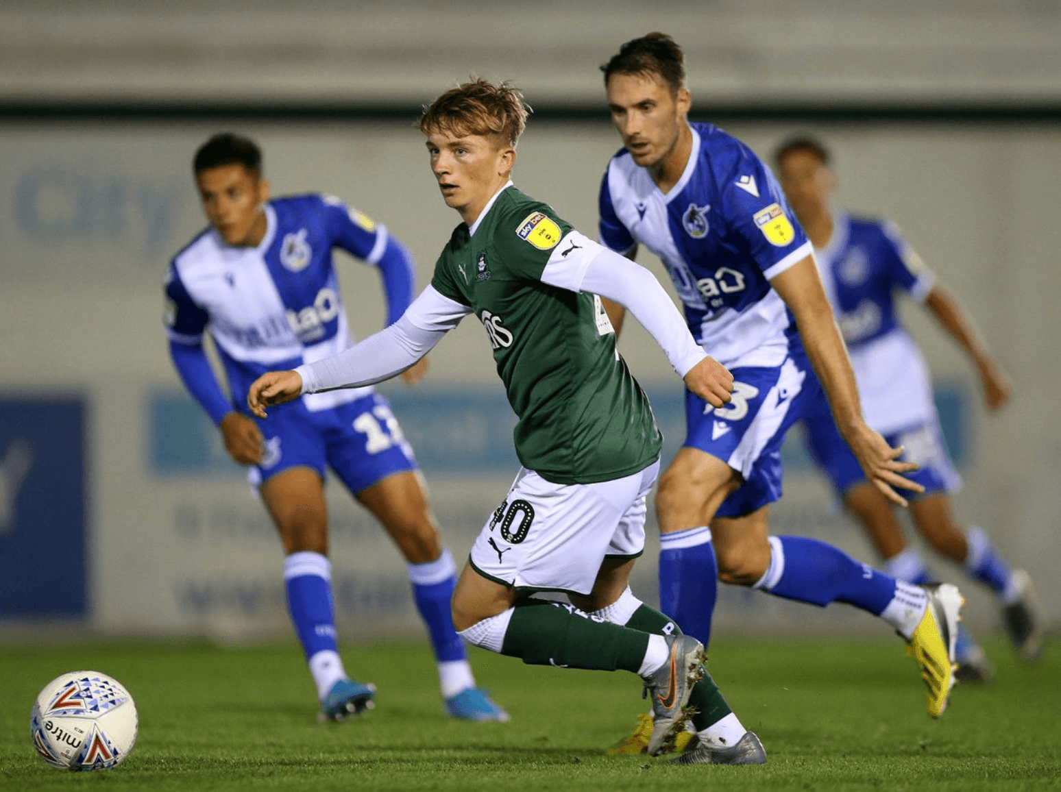 Jude Boyd #40 driving with the ball for Plymouth Argyle in the EFL