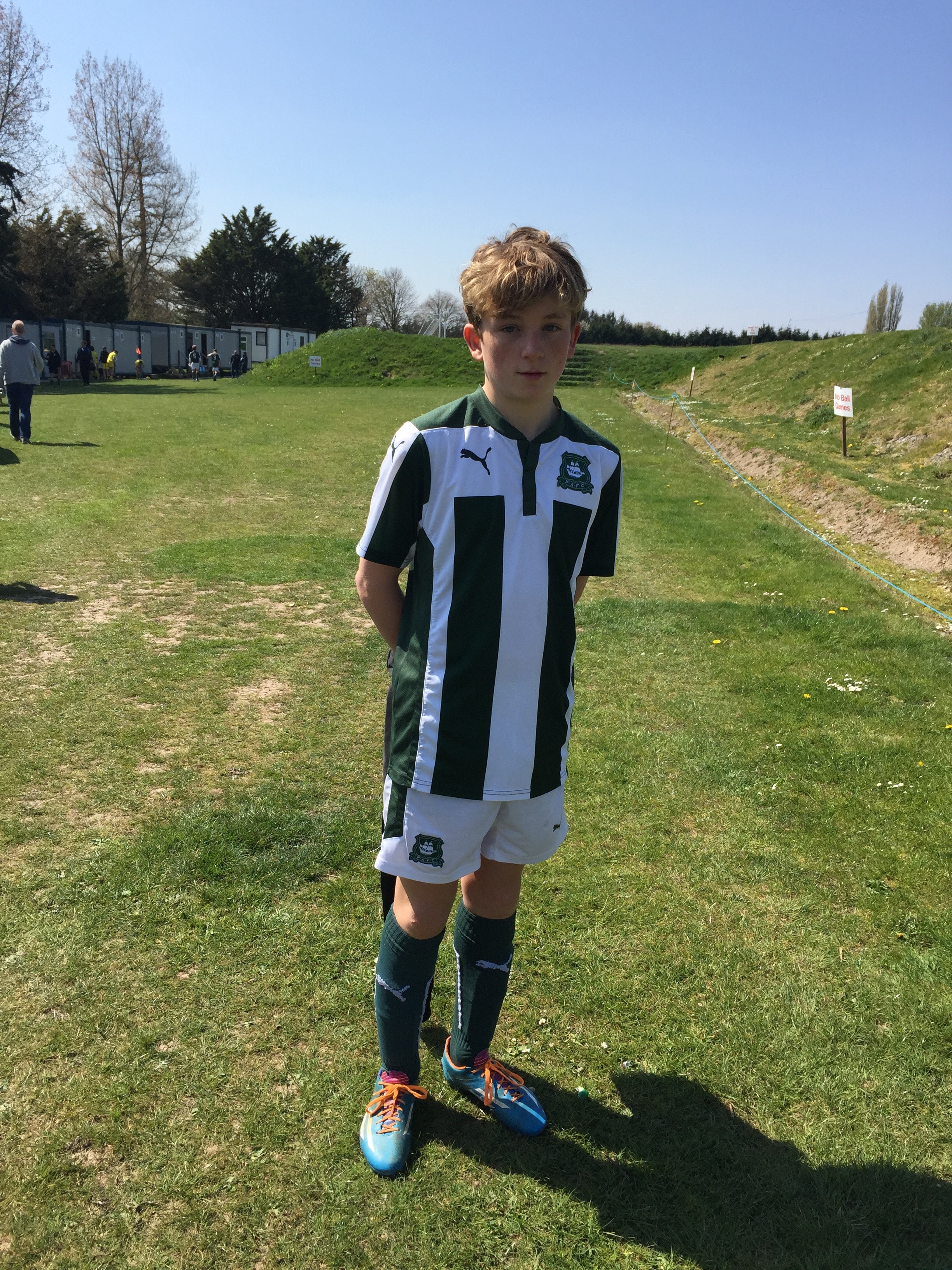 Young Jude Boyd in a football kit